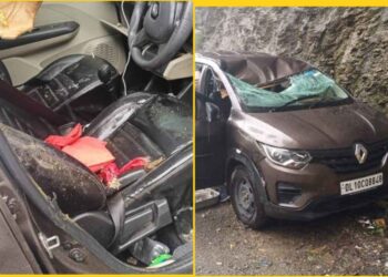 पत्थर के चपेट में आई कार, सभी सुरक्षित