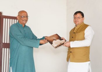 cm dhami in ahemdabad